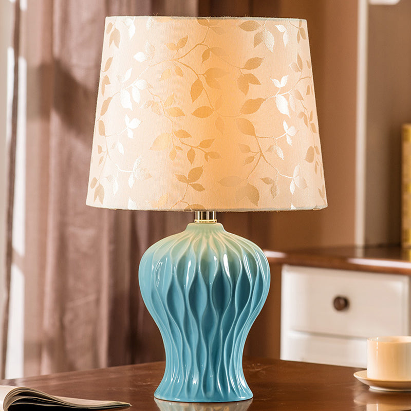 Leaf-Printed Fabric Beige Night Light Barrel Shade 1-Light Traditional Table Lighting with Blue Urn Base