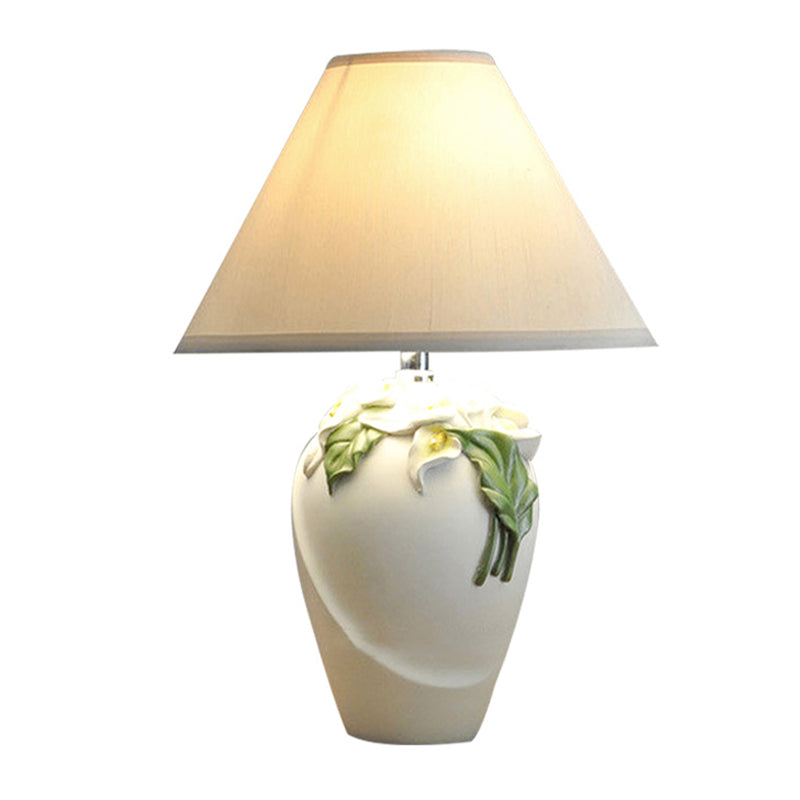 1-Bulb Embossed Lily Urn Night Lamp Rural White and Green Ceramic Table Light with Cone Shade