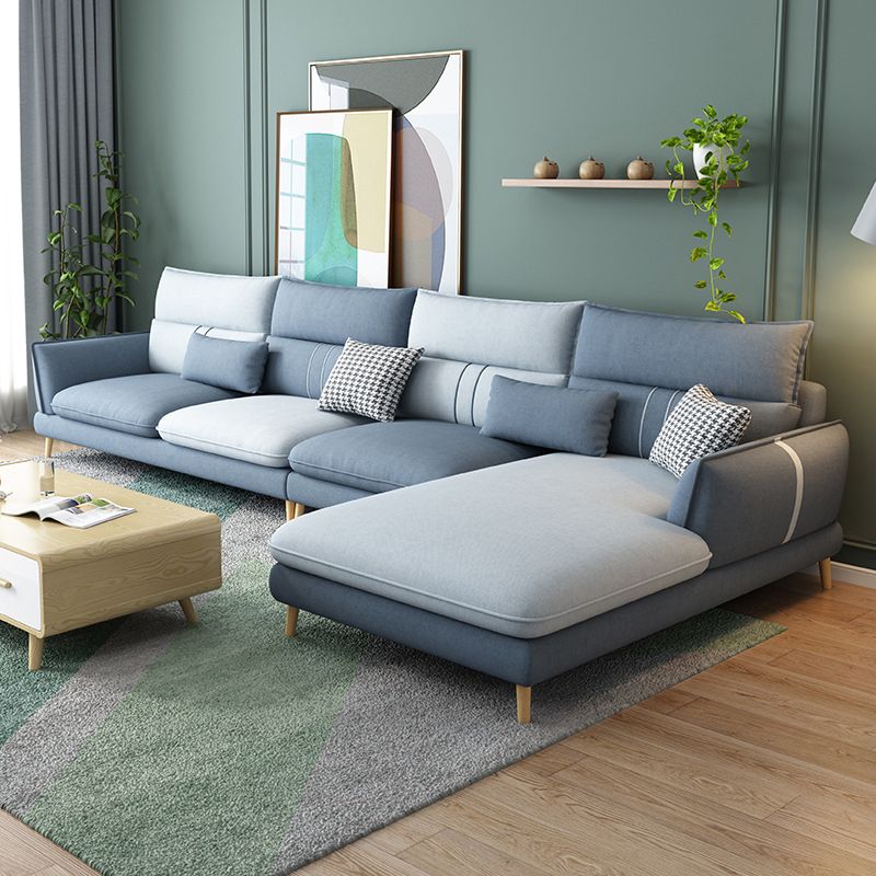 Fabric Pillow Back Sectional Flared Arm Sectional with Wood Accents