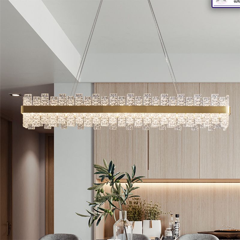 Illuminazione dell'isola rettangolare cristallina increspata luce a led oro minimalista per cena