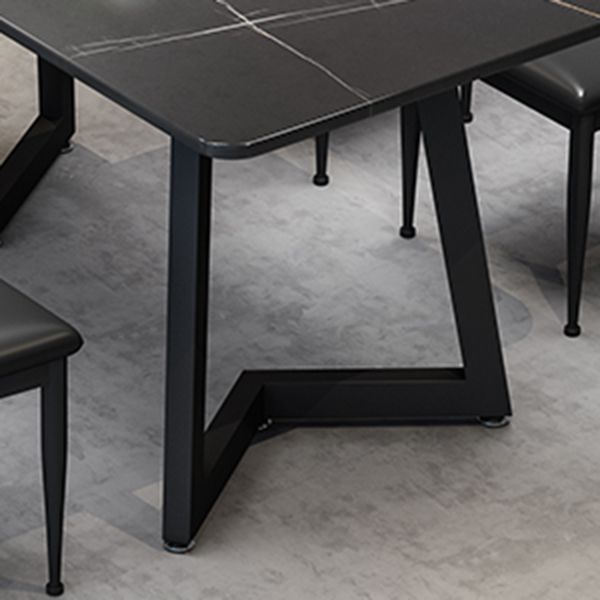 Mesa de comedor de estilo industrial Mesa de comedor de piedra sinterizada negra con base de metal