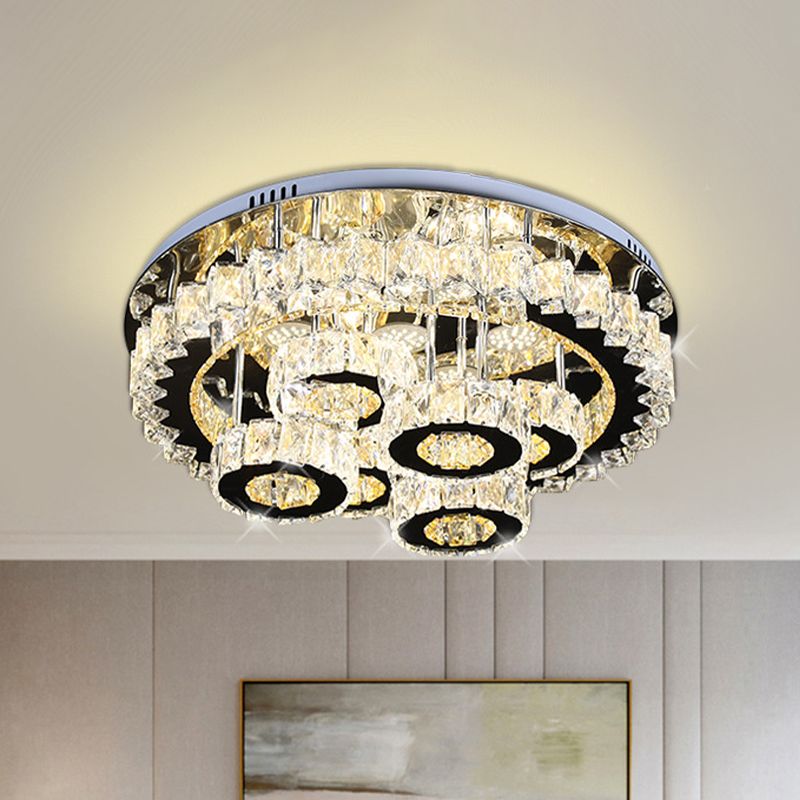 Lumo a soffitto in cristallo simile a un ingranaggio moderno lampada semi-rulli LED in acciaio inossidabile
