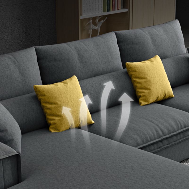 Dark Gray Contemporary Sectional with Recessed Arm and Pillowed Back Cushions