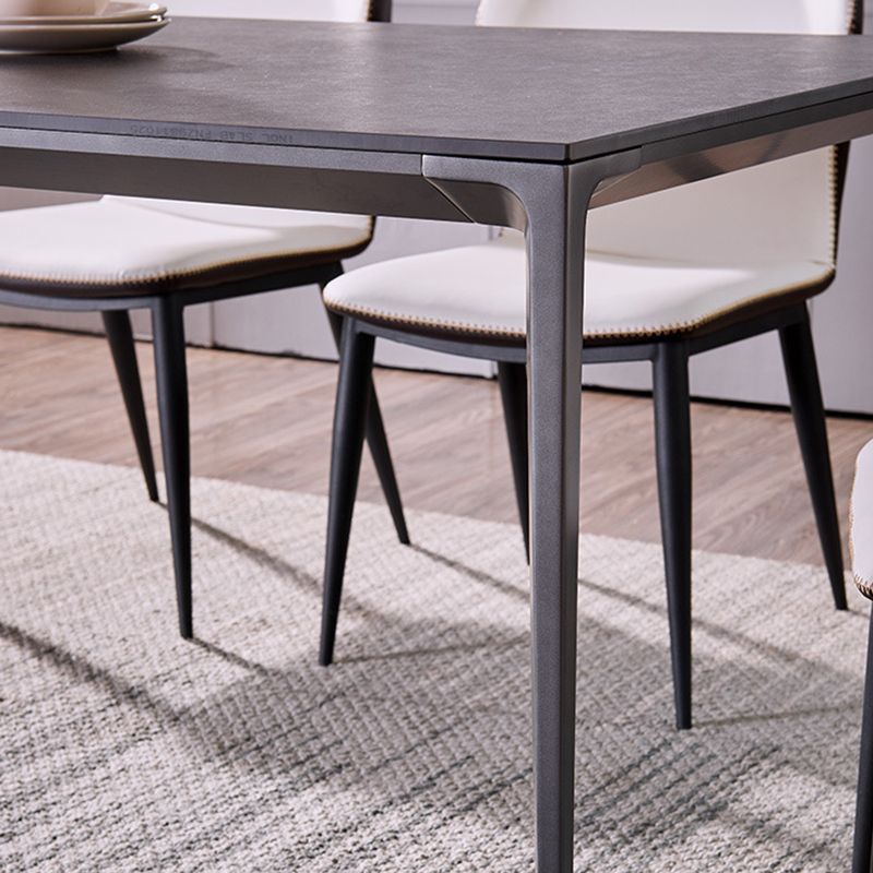 Simplicidad Mesa de comedor de piedra sinterizada Mesa rectangular con cuatro patas metálicas