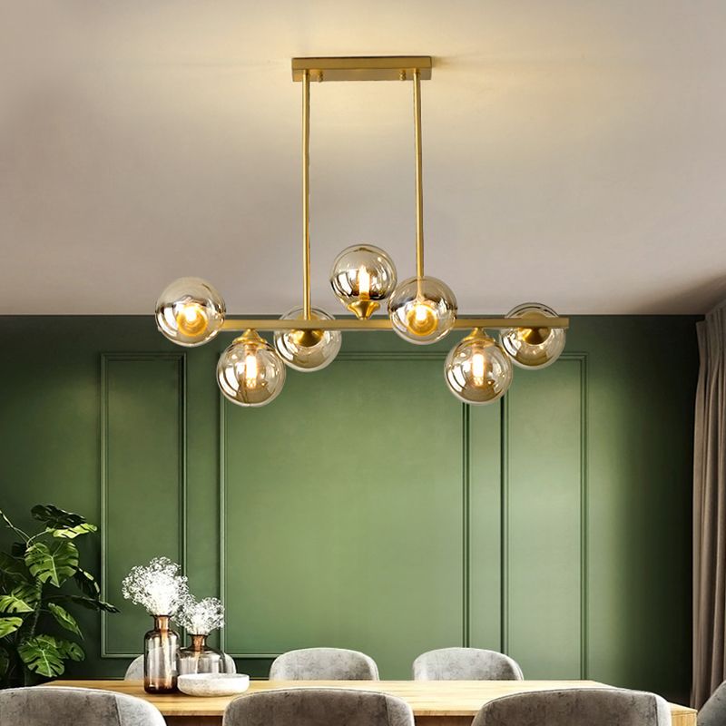 Gold Sputnik Island Pendant Light in Modern Creative Style Copper Indoor Hanging Light with Amber Glass Shade