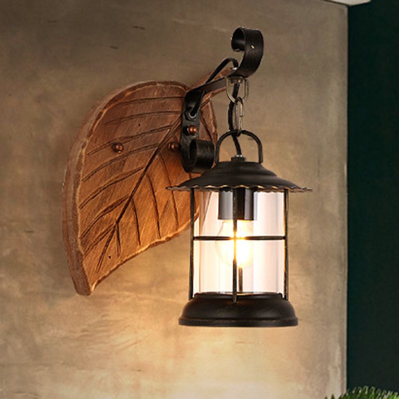 Kerosene Dining Room Wall Lighting Fixture Antiqued Clear Glass 1-Head Brown Sconce with Wood Leaf/Key Backplate