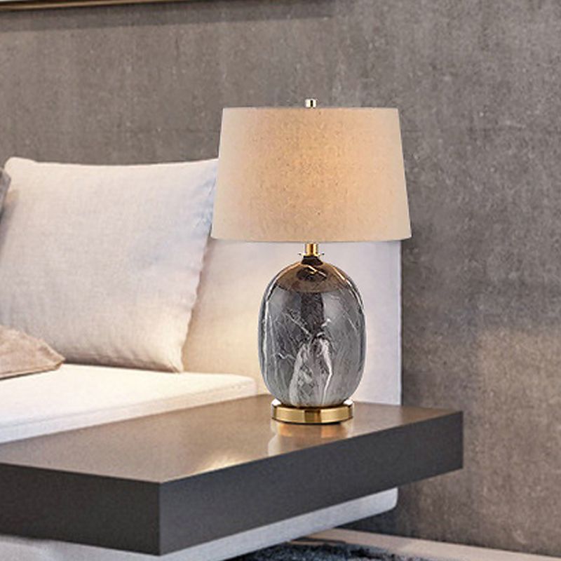 Luz de mesa de barril de lino moderno 1 lámpara de escritorio de tela de bulbo con base de mármol gris oblonga