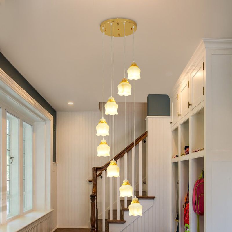 White Glass Floral Cluster Pendant Light Modernism 8 Lights Stair Hanging Lamp in Gold