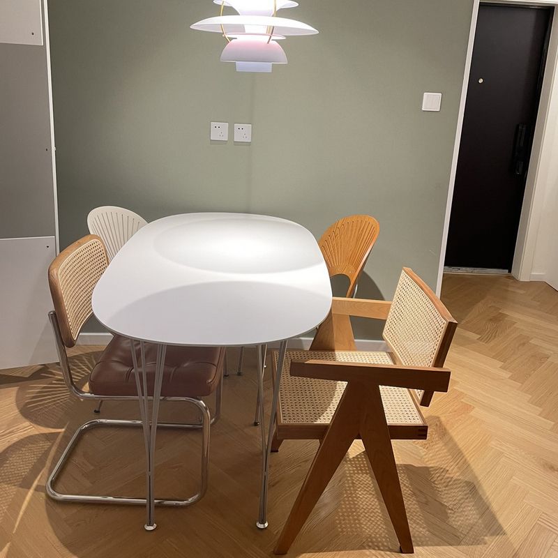 Metal Modern Oval Dining Table Sintered Stone Dining Table with 4 Legs