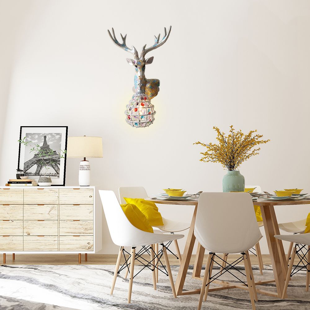 Application de cerf traditionnelle 1 Éclairage mural en résine lumineuse en noir / rose / jaune pour chambre avec une nuance de cristal de gouttelettes, droite / gauche