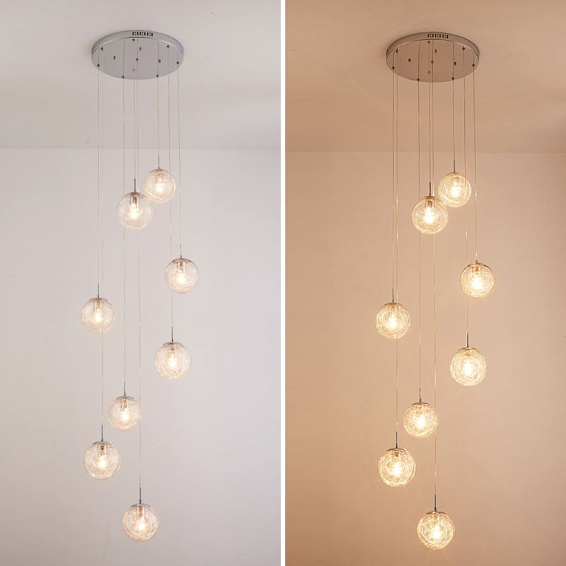 Lumière suspendue en argent dans la lampe suspendue du globe en acier inoxydable de style de luxe moderne pour les escaliers