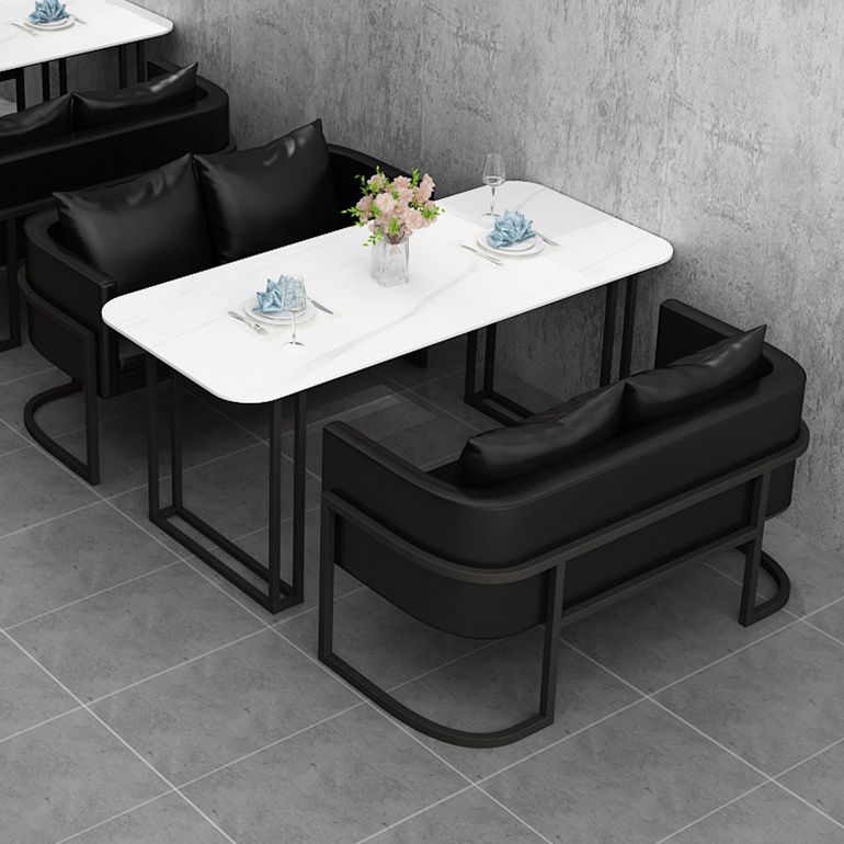 Table à manger de luxe traditionnelle table de pierre fritrée avec base en métal pour salle à manger
