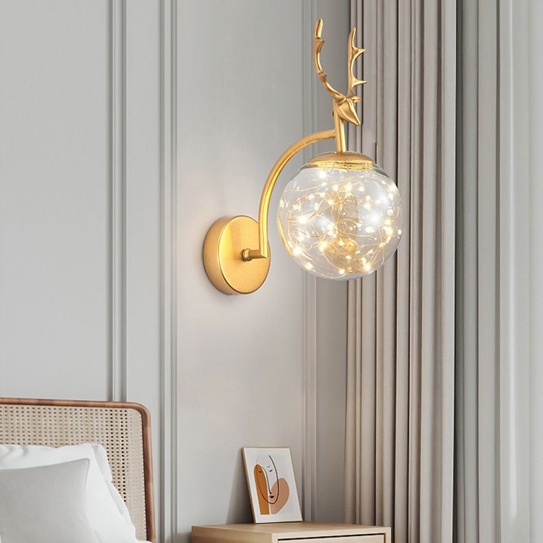 Glass Globe LED Wall Lamp in Modern Fashionable Wrought Iron Wall Sconce with Antler Decoration