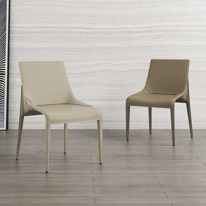 El cuero minimalista del diseño que cena el lado preside la silla sólida sin brazos con parte posterior