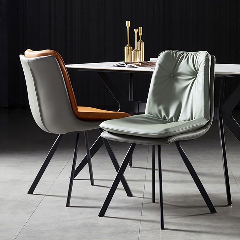 Sillas laterales con respaldo sólido sin brazos de diseño minimalista Sillas de comedor de cuero