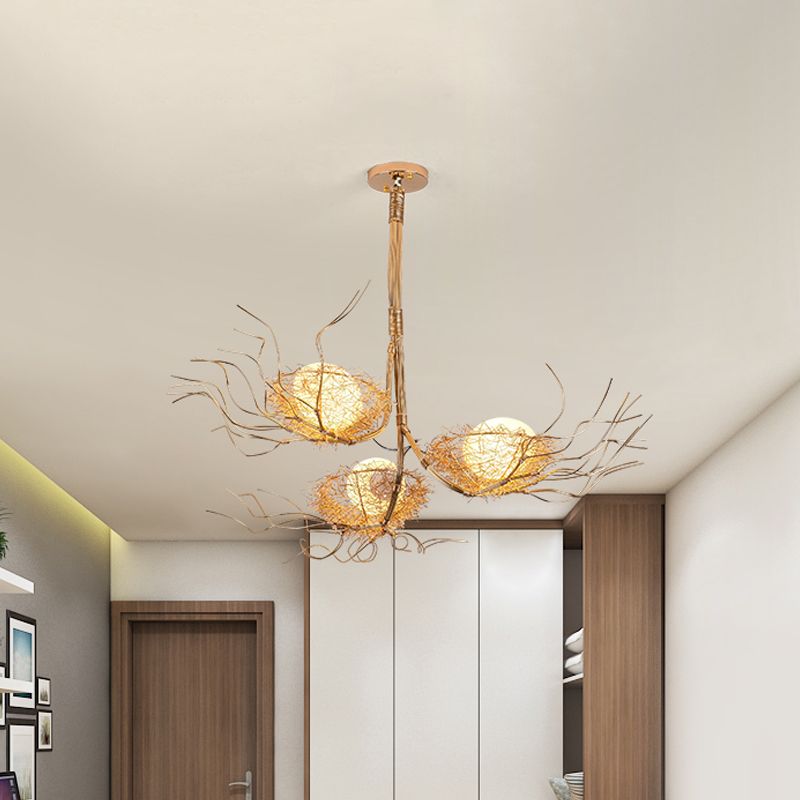 Modern Branch Hanging Light met Nest & Egg Three Lights Metal Kroonluchter in goud voor studieruimte