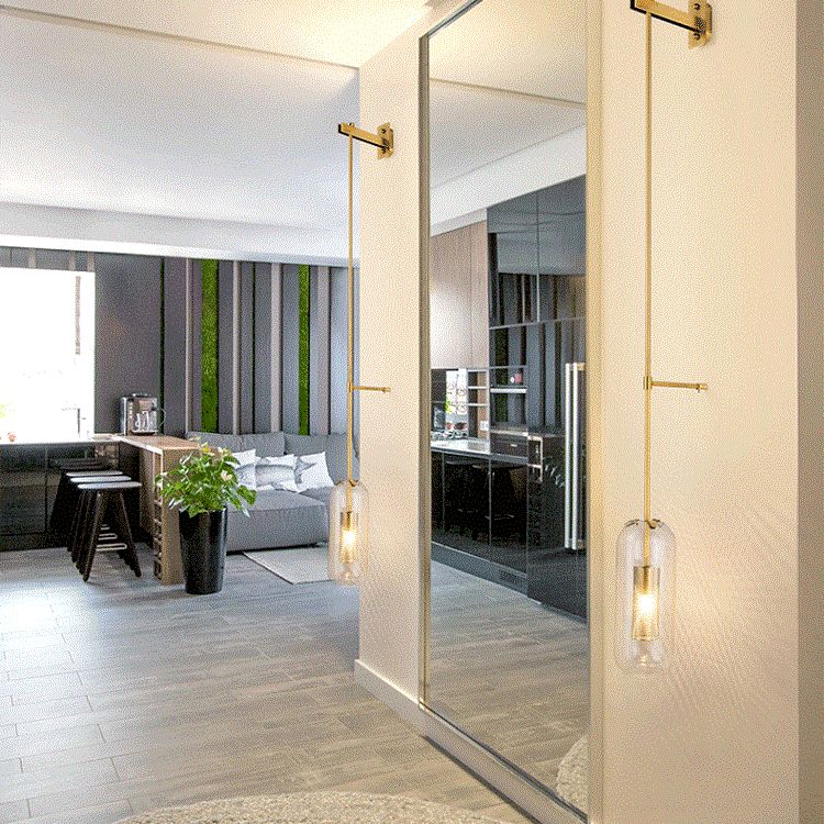 Vintage stijl messing wandlamp met helder glas