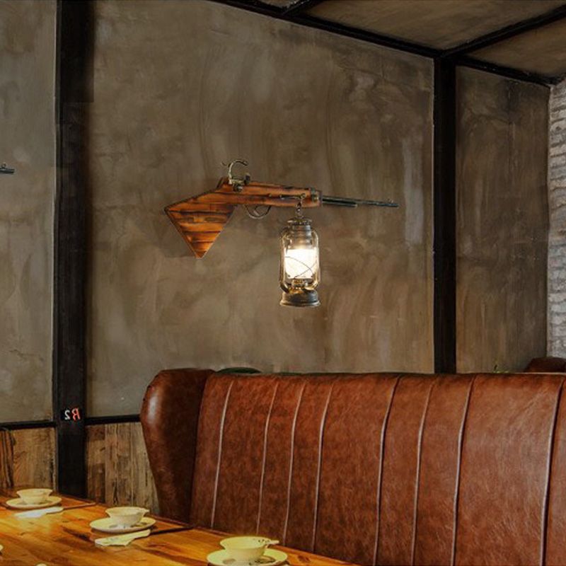 1 Bulb Lantern Wall Mounted Light Fixture Coastal Bronze Clear Glass Lighting with Gun Decoration