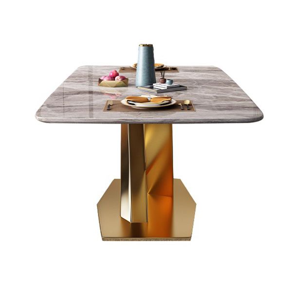Mesa de comedor de lujo tradicional rectángulo mesa de piedra sinterizada gris con base de pedestal dorado