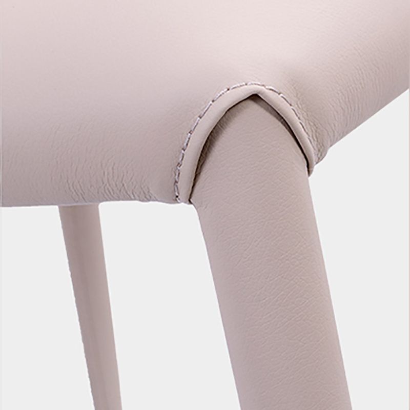 Minimalistische stijl armloze vaste achterzijde stoelen lederen eetkamerstoelen voor thuis