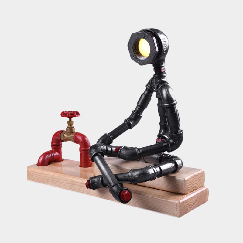 Lámpara de mesa LED Industrial con patas cruzadas de hierro para dormitorio, lámpara de noche en negro con válvula decorativa y base de madera rectangular