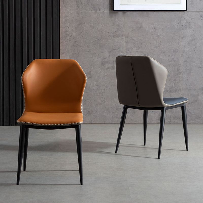 Silla moderna del comedor del metal Silla sin brazos Wingback para el restaurante