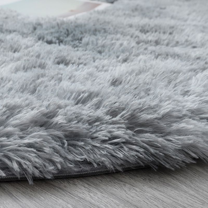 Tapis en peluche élégant Tapis de couleur solide Polyester Area Tapis résistant aux taches pour la décoration intérieure