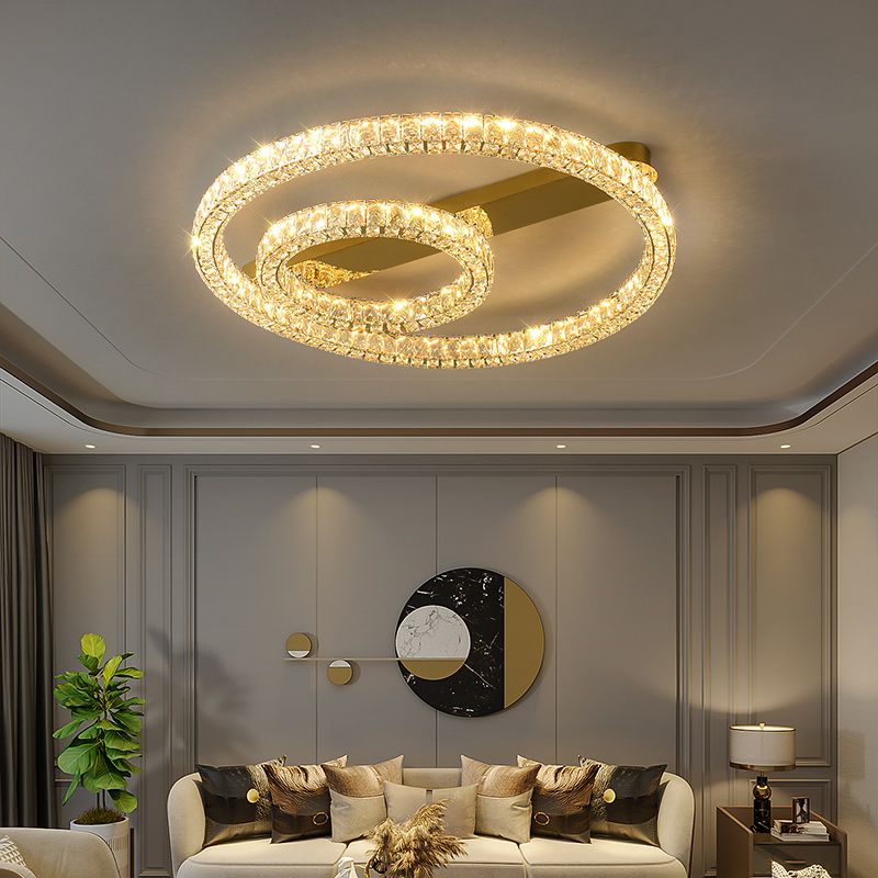 Moderne, runde Deckenleuchte aus Kristallglas in Gold für das Wohnzimmer