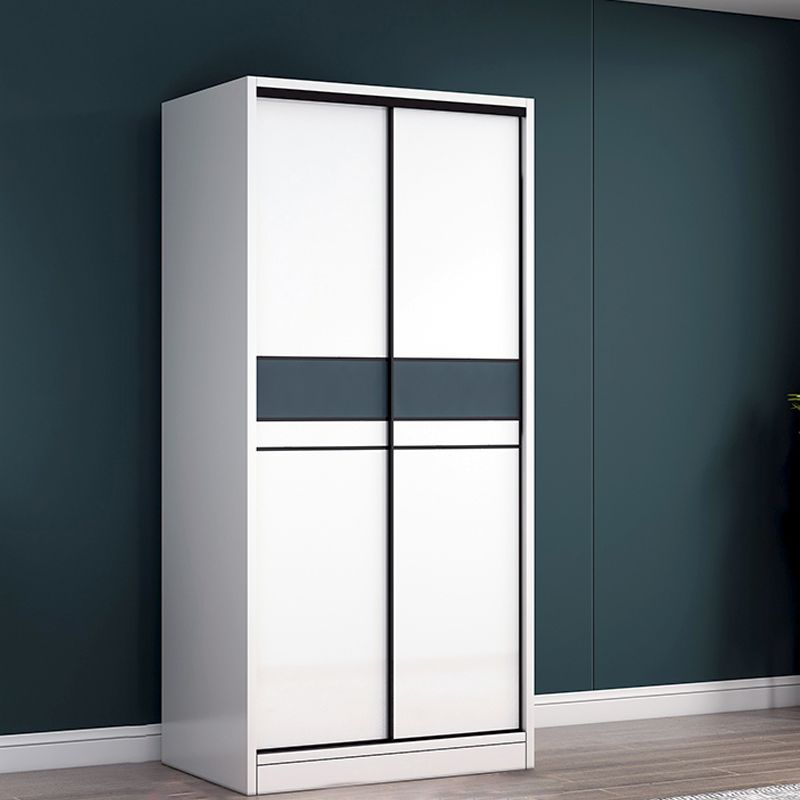 Contemporary White Kids Closet Closet with Sliding Barn Door