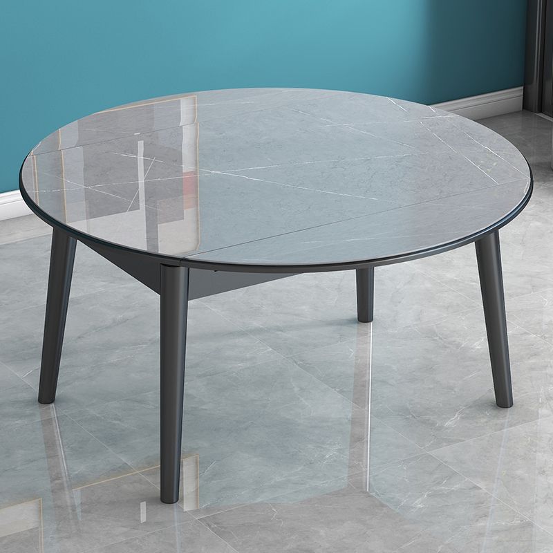 Tavolo da pranzo in pietra sinterizzato in stile moderno tavolo a goccia rotonda con base di legno