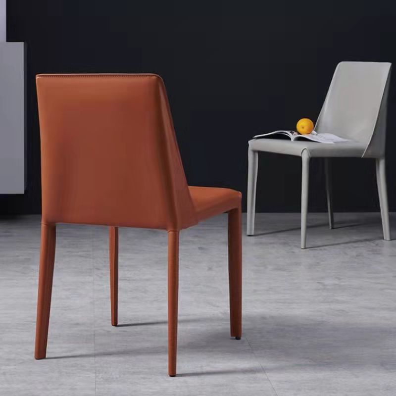 Sillas laterales de comedor con respaldo sólido sin brazos de estilo minimalista Sillas de comedor de cuero