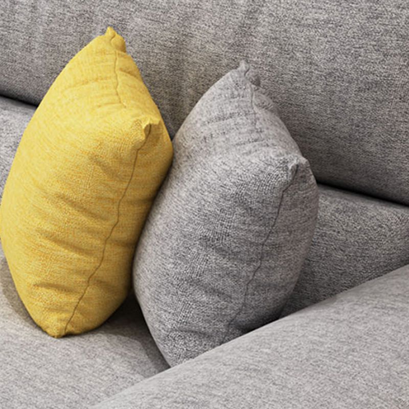 Divano chaise reversibile moderno con cuscini sezionali di braccio svasato per soggiorno