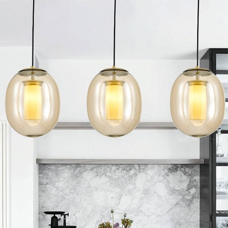 Kit de lámpara colgante ovalada de vidrio transparente contemporáneo 7 "/8.5" de ancho 1 cabeza de oro Luz de oro para comedor