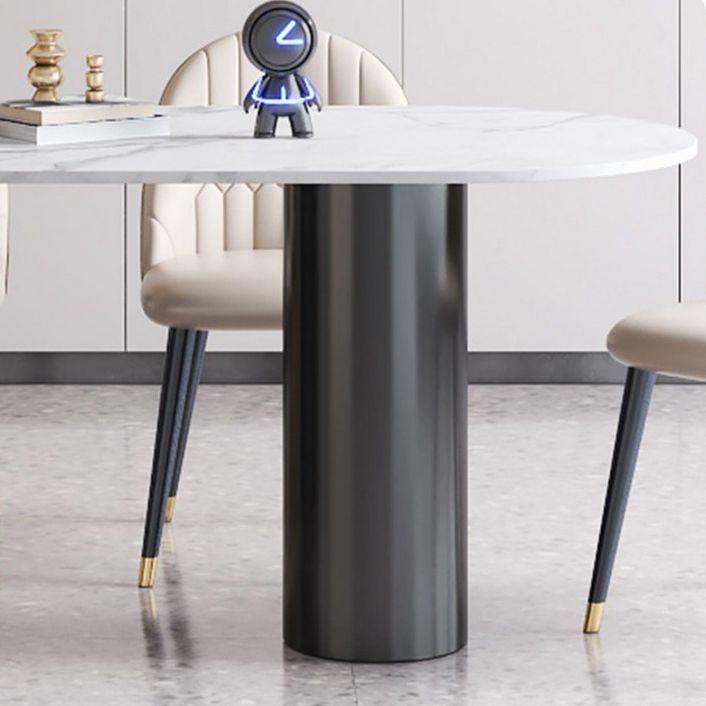 Mesa de comedor Simplicity de 3 patas en tono blanco de piedra sinterizada para comedor