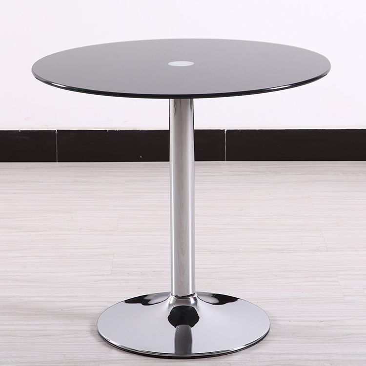 Moderne ronde eettafel van gehard glas met tulponderstel voor eetkamer
