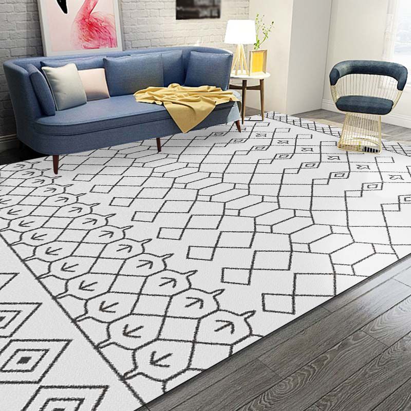 Tapis à imprimé tribal de ton blanc