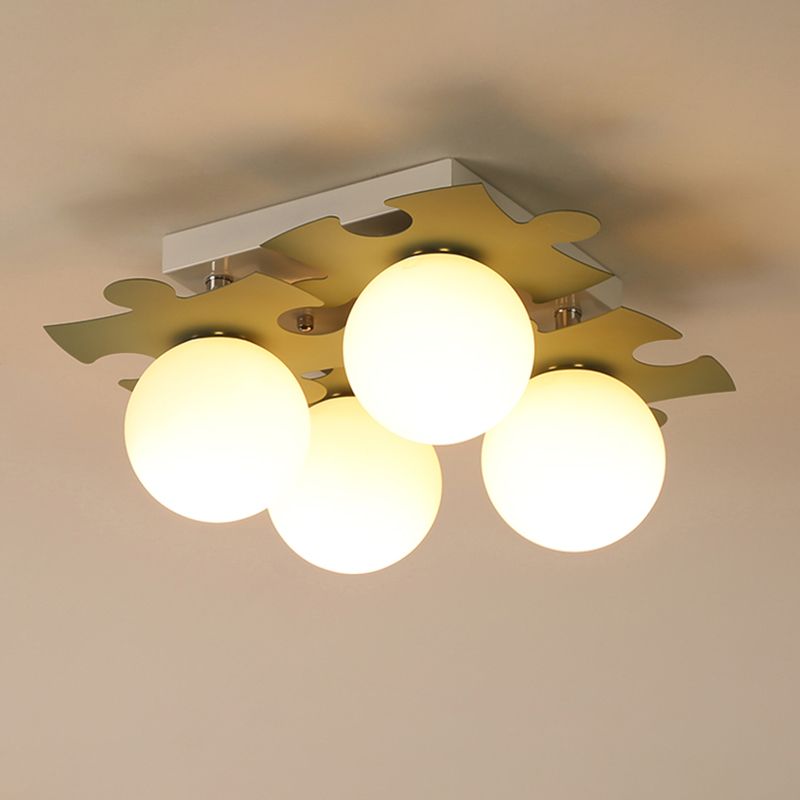 Globe di vetro bianco semi-filo modernista Modernist 4-bulb Luce a filo con decorazione puzzle in grigio/verde