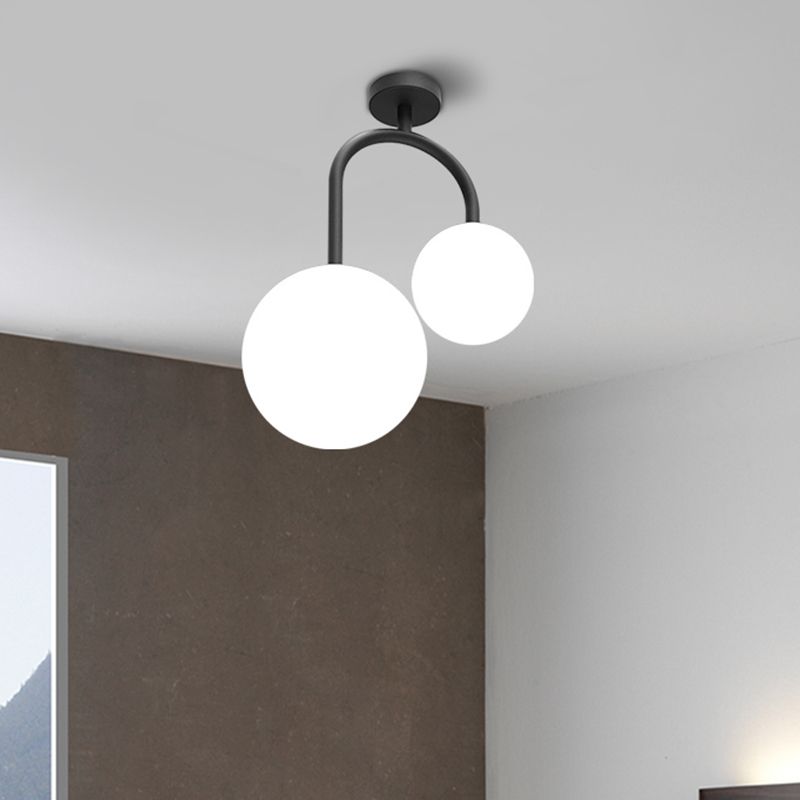 2 Heads Spherical Semi Flush Mount Modernist Milk Glass Ceiling Light Fixture in Black
