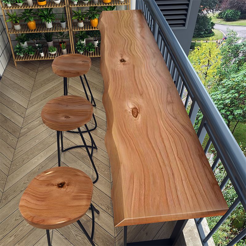 Industrial Specialty Bar Table Brown Solid Wood Bar Height Cocktail Table with Sled Base