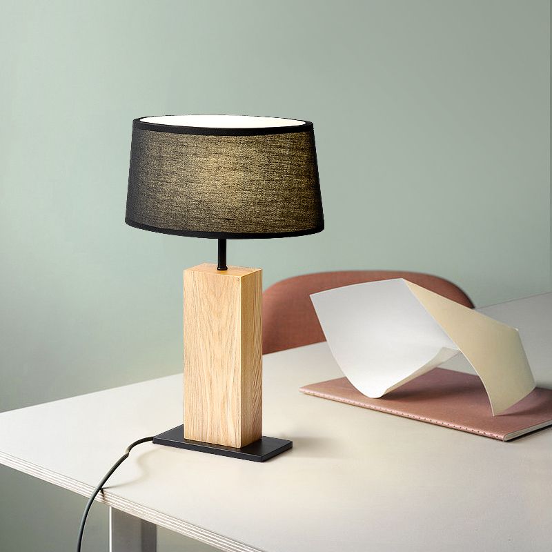 Lumière de nuit ovale noire simple lampe de table en tissu simple avec support en bois rectangulaire pour le salon