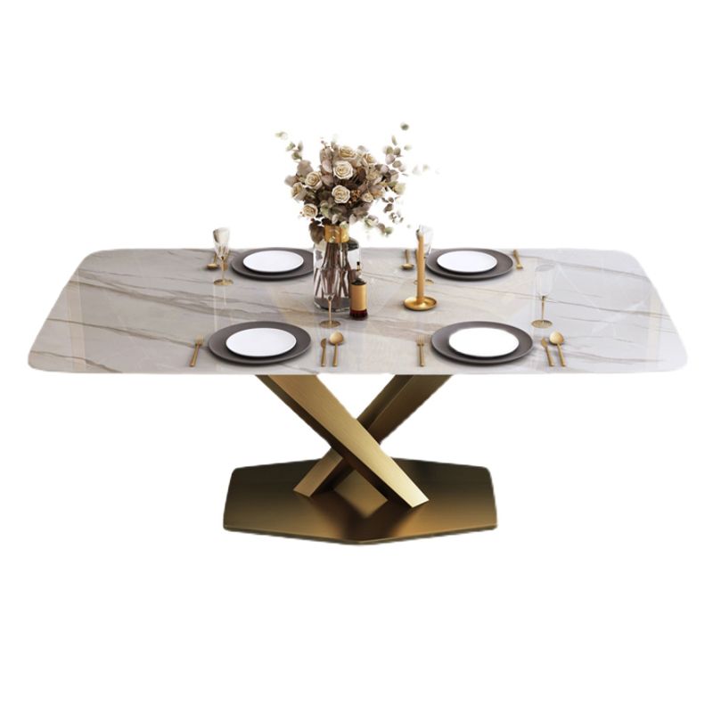 Mesa rectangular de piedra sinterizada con base de pedestal de metal dorado