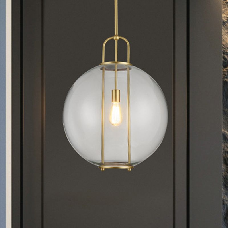 Postmodern Globe Clear Glass Hanging Lamp 1-Light Ceiling Pendant in Brass for Bedside