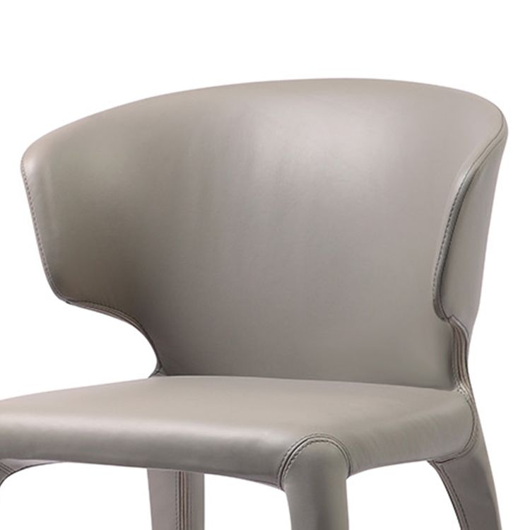 Silla de comedor individual con respaldo de ala y acabado mate de sillón de cuero estilo diseñador
