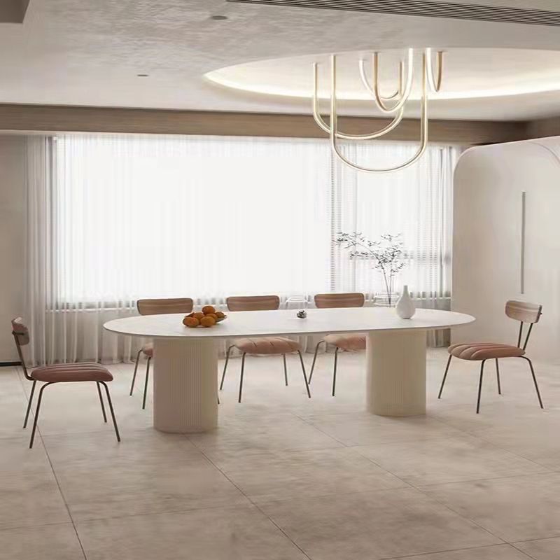 Table à manger ovale moderne en pierre frittée avec base à double piédestal