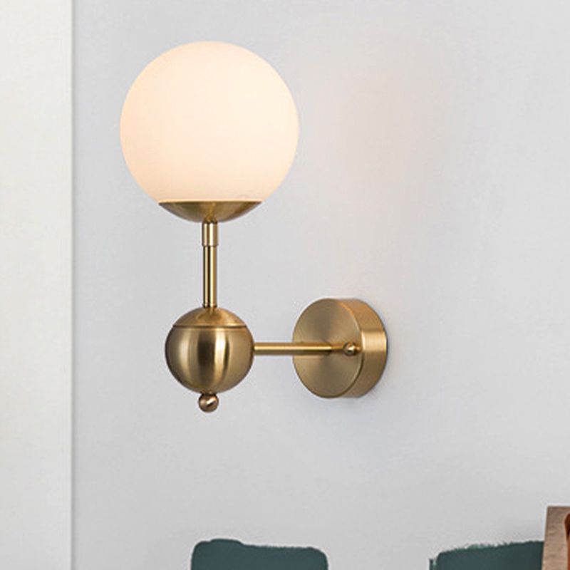 Modern Globe Wall Lighting Fixture 1 Bulb White Glass Sconce Light in Brass for Bathroom