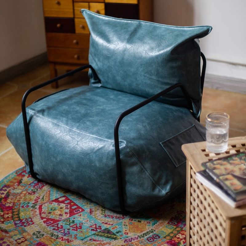 Contemporary Armchair Pillow Back Round Arms with Black Legs Leather Arm Chair