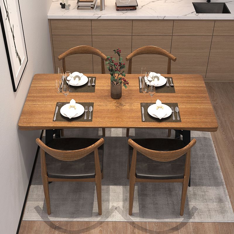Metaal industriële rechthoek eettafel vaste houten tafel met sleeënbasis