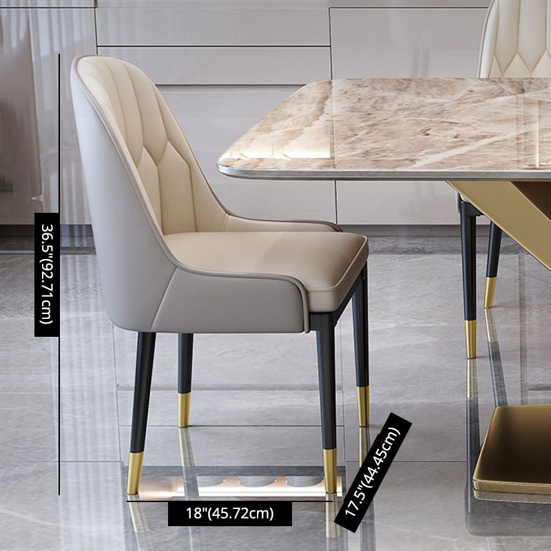 Style minimaliste Ensemble de salle à manger en pierre fritté avec table fixe et base de chevalets en or pour un usage domestique