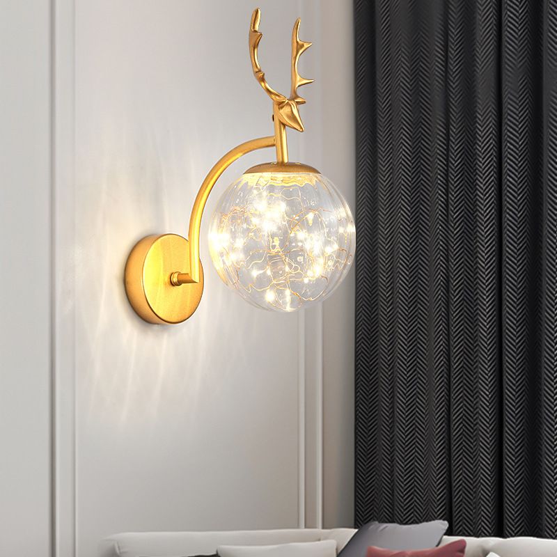 Glass Globe LED Wall Lamp in Modern Fashionable Wrought Iron Wall Sconce with Antler Decoration
