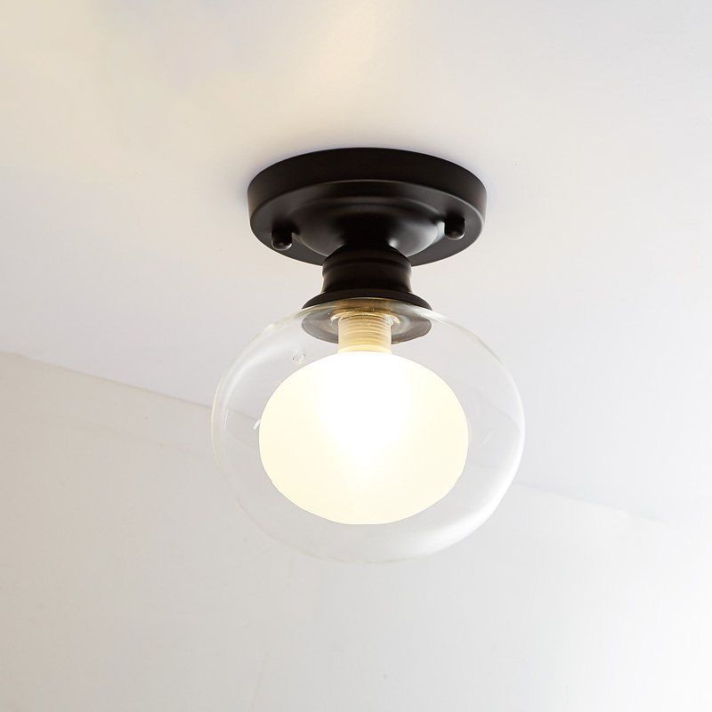 Lampada da soffitto sferica a semi-incasso in vetro. Semplice plafoniera nera a semi-incasso